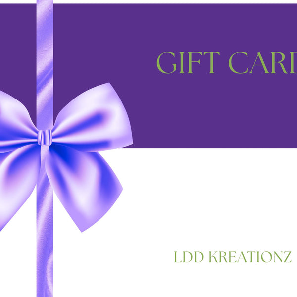 A  gift card from LDD Kreationz with a vibrant design, featuring a stylish envelope icon. The gift card is available in multiple denominations and can be used to purchase custom apparel and sublimation prints from our store.