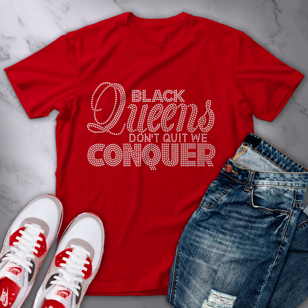 T-shirt with sparkling rhinestone text reading "Black Queens Don’t Quit We Conquer"