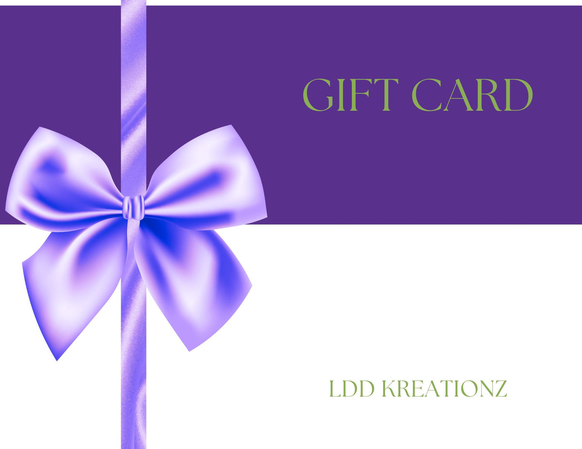 A  gift card from LDD Kreationz with a vibrant design, featuring a stylish envelope icon. The gift card is available in multiple denominations and can be used to purchase custom apparel and sublimation prints from our store.