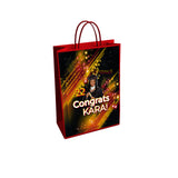 Set of 12 custom glossy photo gift bags with handles, perfect for birthdays, holidays, and corporate events.