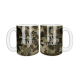 Camo U.S. Army coffee mug, two sides shown, tan, brown and green camo with U.S. ARMY in black letters