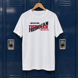 White custom Freshman class year shirt in red and black school colors on a hanger against navy school lockers
