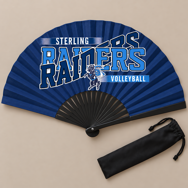 Flat lay of an open navy game day clack fan with black ribs and a volleyball team design, beside its black drawstring bag.