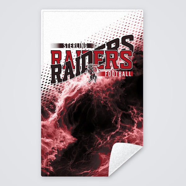 Red and black game day rally towel with the Raiders football design, corner folded to show the white back