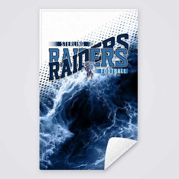 Game day rally towel with a navy and light blue Raiders football design and horse and rider mascot, rally towel with the corner folded to show the white back