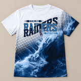 Flat lay of the all over game day spirit shirt, white fading into navy ocean waves with a halftone dot pattern and a navy and light blue football team design.
