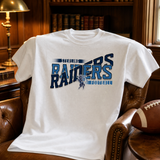 White game day spirit shirt with a navy and light blue football team design draped over a leather armchair in a home office.