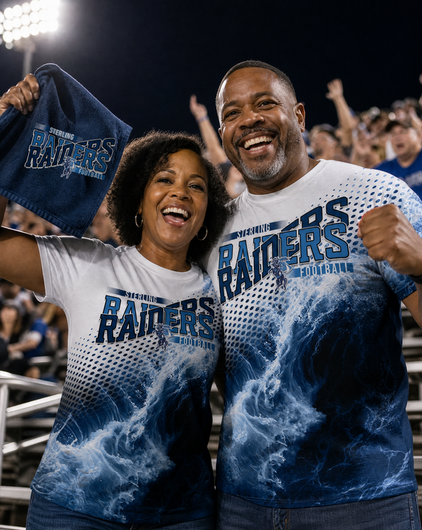 Mom and dad cheering in the stadium stands on a Friday night, both wearing navy and light blue all over game day shirts with a horse and rider mascot.