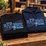 Folded stack of black game day tees and a navy game day hoodie with a volleyball team design on a wooden store table.