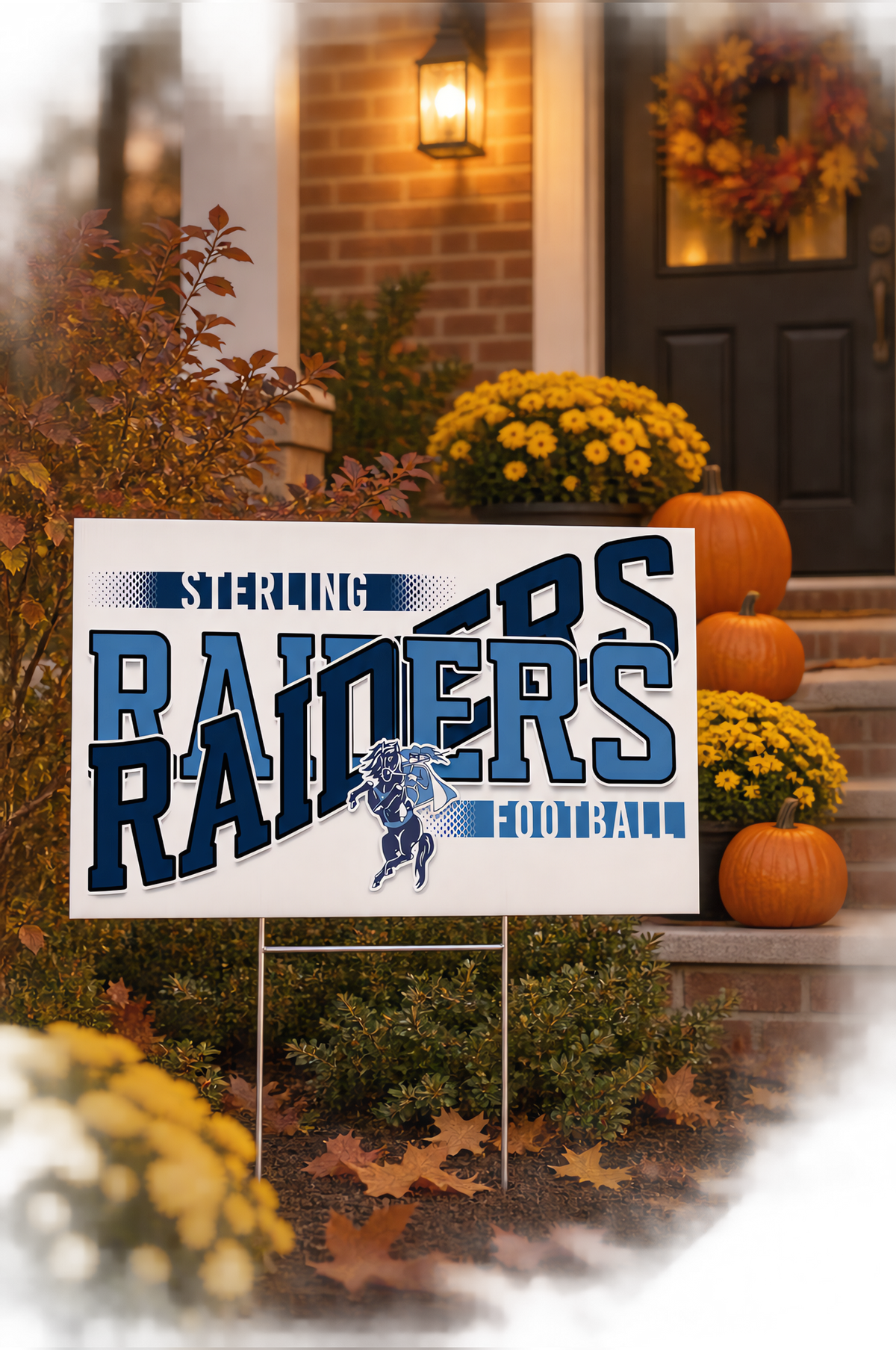 Game day yard sign with a football team design by the front steps of a porch decorated with pumpkins and mums in the fall.
