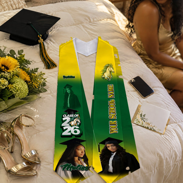 Green and gold graduation stole with Class of 2026 and horse mascot on a bed with cap, heels and flowers