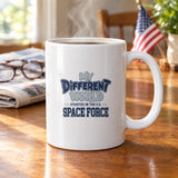 My Different World Started in the U.S. Space Force coffee mug with hot coffee on a wooden kitchen table, with reading glasses, a newspaper and a small American flag
