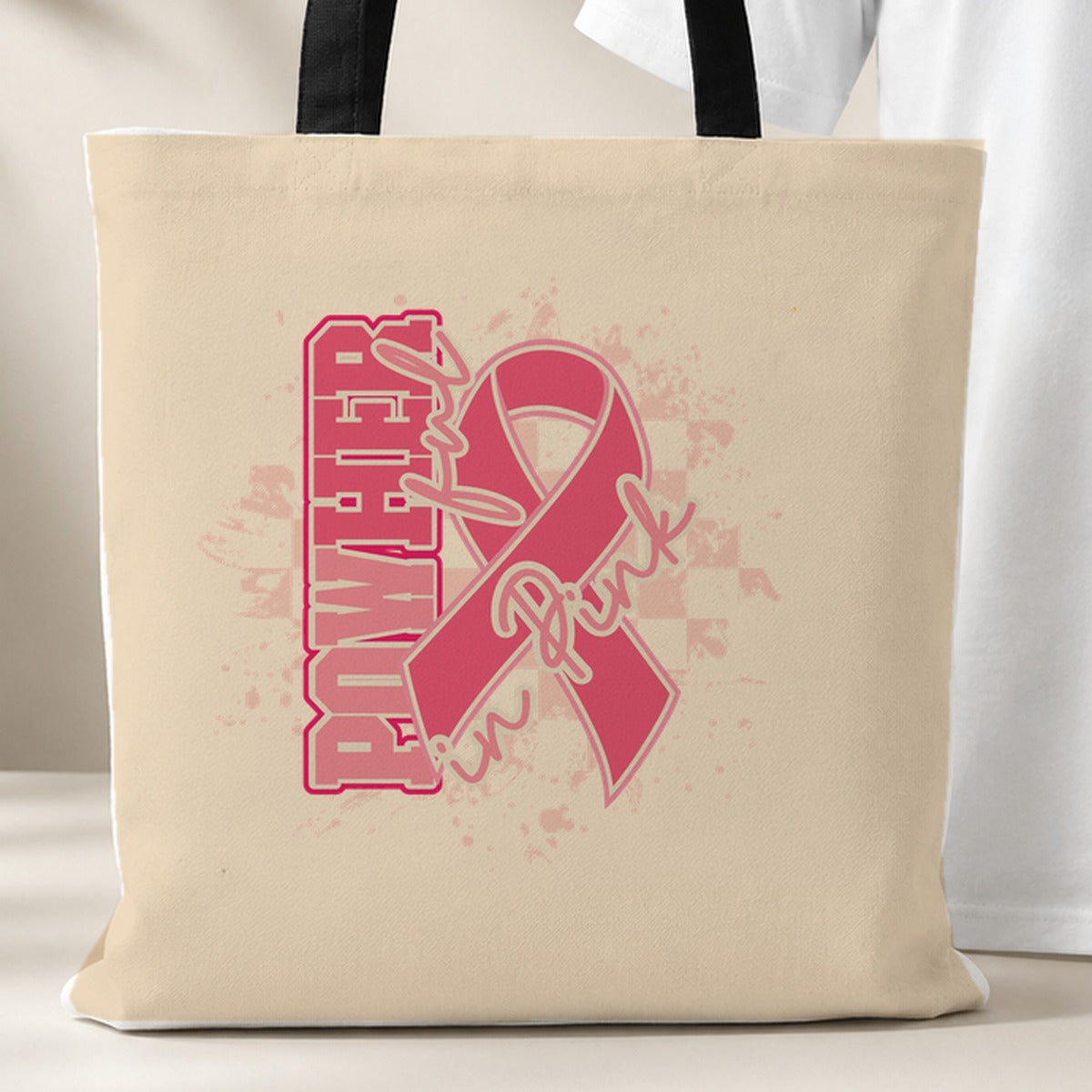 PowHerful in Pink tote bag, beige with black handles, pink ribbon design