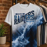 Slow push in on the all over game day spirit shirt hanging on a boutique clothing rack.