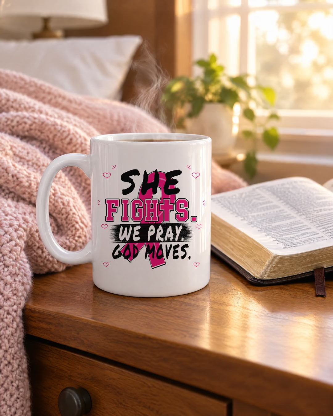 She Fights We Pray God Moves breast cancer awareness mug on a nightstand beside an open Bible, short video