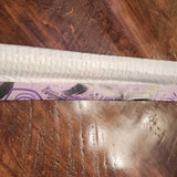 Close-up of vibrant ready to press custom sublimation transfers with a heat press, emphasizing quality and local Houston pickup service for small businesses.