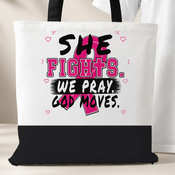 White She Fights We Pray God Moves Breast Cancer Awareness tote bag with black bottom panel and black handles