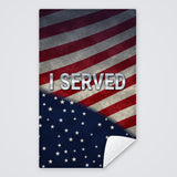 Veterans Day towel with I SERVED in silver letters across a weathered American flag, rally towel with the corner folded to show the white back