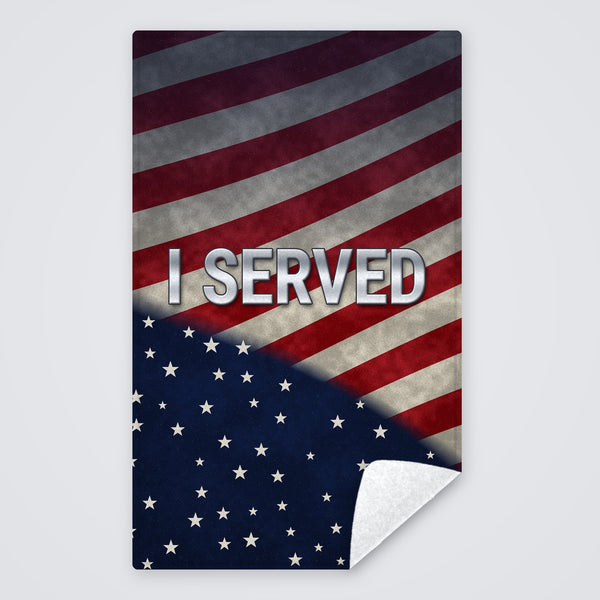 Veterans Day towel with I SERVED in silver letters across a weathered American flag, rally towel with the corner folded to show the white back